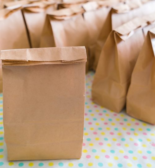 Brown paper bags on table